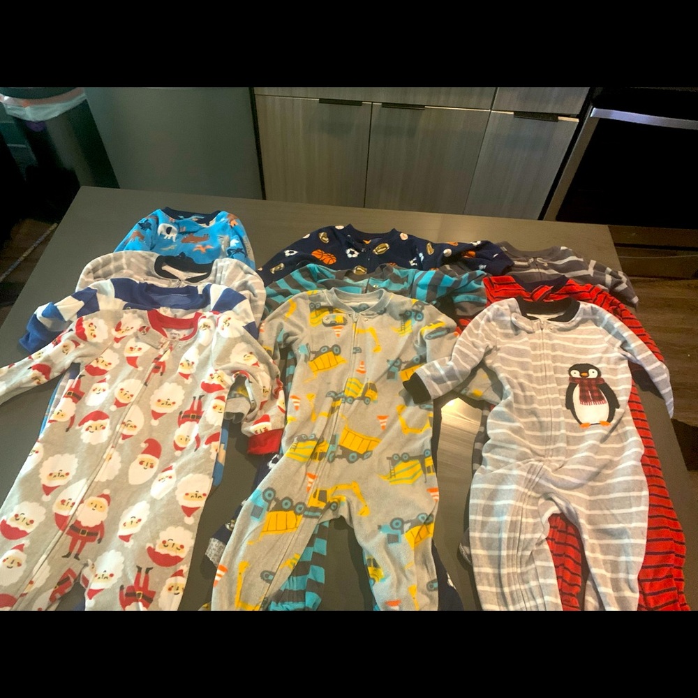 Very gently used and new pajama onzies 2t